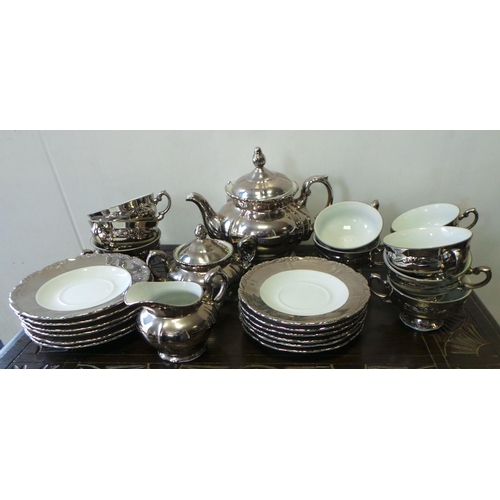 169 - Bavientthal Tea Set, 12 saucers, 10 cups, 1x milk 1x Tea pot and lid.