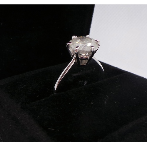 156 - 18ct White Gold Ring, with Salt and Pepper (cloudy) Diamond, approx. 8mm diameter.  Size: M 1/2