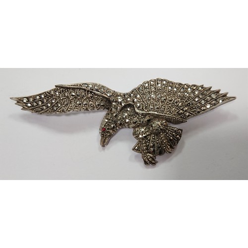 329 - Sterling Silver & Marcasite Eagle Brooch with Ruby Eyes, Wing Span: 8cm, Boxed