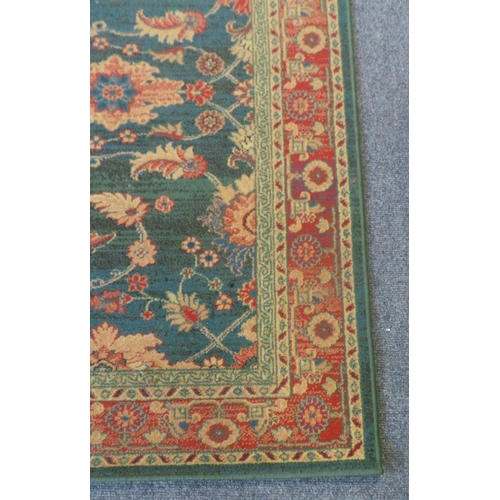 192 - Large Green & Red rug (210cm x 160cm)