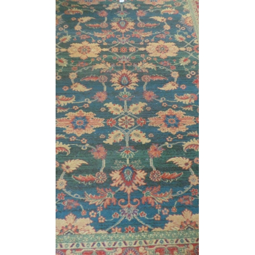 192 - Large Green & Red rug (210cm x 160cm)