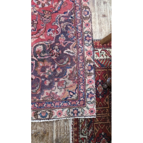 437 - Washed Red Ground Persian Mashad Rug with Traditional Medallion Design, 225cm x 140cm