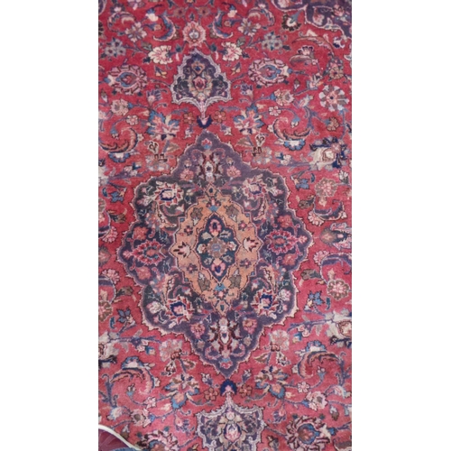 437 - Washed Red Ground Persian Mashad Rug with Traditional Medallion Design, 225cm x 140cm