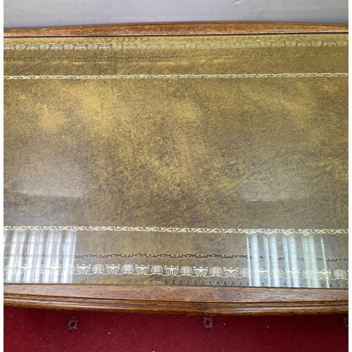 51 - Glass Top mahogany coffee table