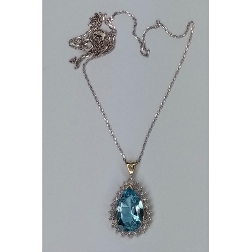 202 - Gold, Blue Topaz, Diamond Pendant, on 16