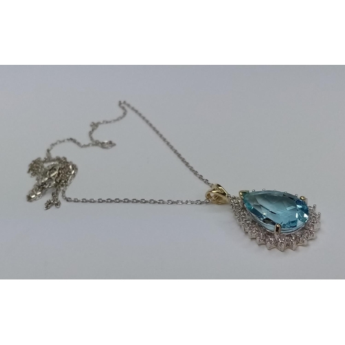 202 - Gold, Blue Topaz, Diamond Pendant, on 16