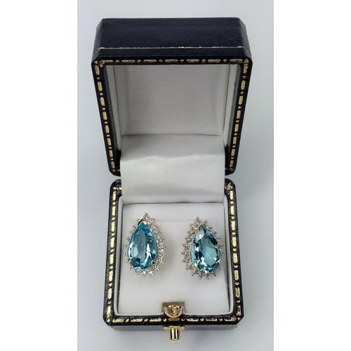 203 - Gold Blue Topaz Diamond Earrings