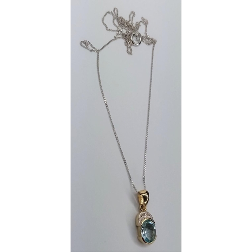 330 - Gold Diamond & Aquamarine Pendant, on 16