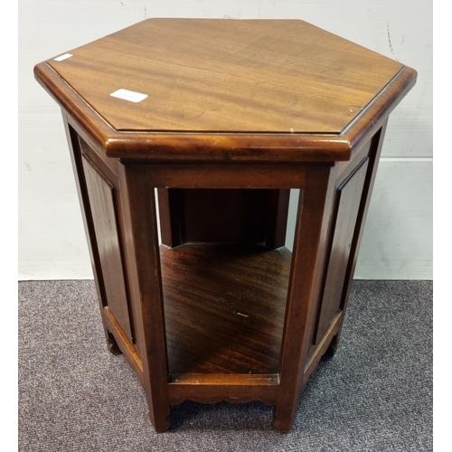 166 - Mahogany Hexagonal Plant Table

Height 54cm with 42x42cm top