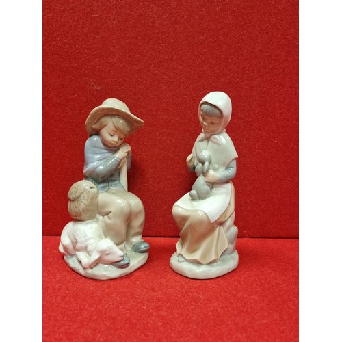 173 - Lot of 2x Nao Figures, Boy and Girl Seated