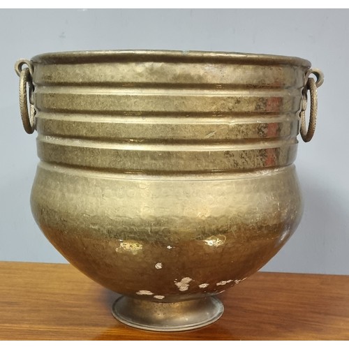 294 - Brass Jardinere

Height 31cm
Diameter 36cm inc.handles Opening 31cm