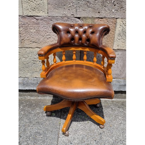 111 - Leather button back captain's office swivel chair