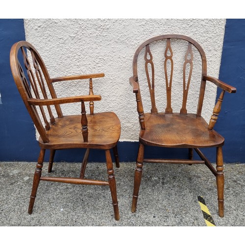 732 - Pair of Elm and Beech low back Windsor style armchairs on turned supports and stretchers.