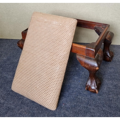 25 - Ball and Claw Mahogany Footstool with tapestry cushion top, H:30 x W:54 x D:35cm