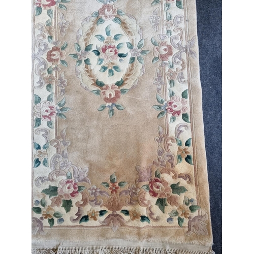 34 - Wool Embossed Cream and FLoral Rug, L:208cm x W:91cm