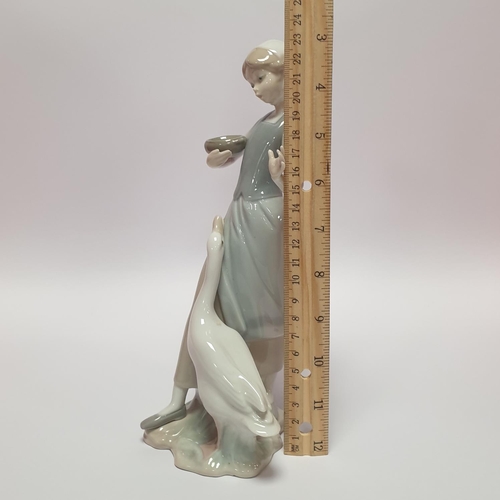 38 - Lladro Figure, Girl with Goose. Height 23cm