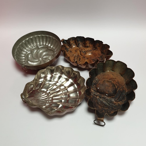 114 - Four Antique Copper Jelly Moulds