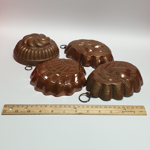 114 - Four Antique Copper Jelly Moulds