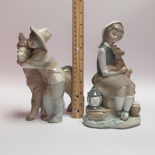 154 - Two Lladro Figures, Boy with Donkey & Girl with Puppy. Height 22cm