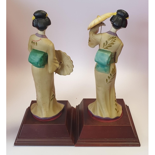 19 - Pair of Ceramic Geisha Figures on Stands