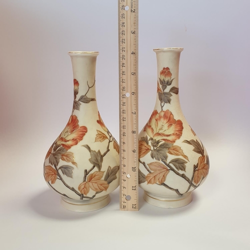 25 - Pair of Floral and Gilt Vases (indistinct 196 number) 21cm height