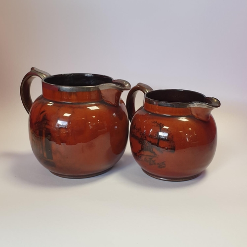 38 - Two Athlo Ware Jugs 