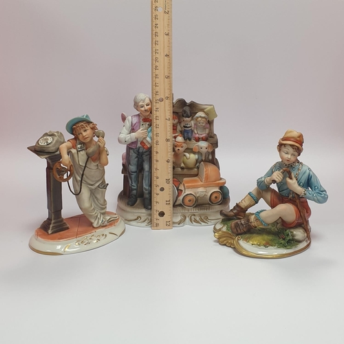 47 - Lot of Three Capodimonte Porcelain Figures. Toy Shop and two others.