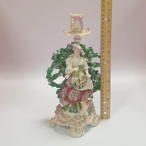 147 - Continental Porcelain Figural Candlestick with mark on back, approx. 28cm high