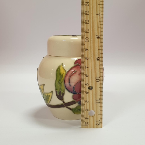 152 - Small  Moorcroft 'Magnolia' ginger jar and cover; 11cm high