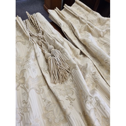 828 - Two Pairs of Gold French Pleat Curtains and four tiebacks. Width 40 inches, Drop 100 inches each