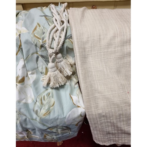 831 - Two Pairs of Tape Top Curtains, one Cream, one duck Egg Floral, and one pair of Tiebacks (measuremen... 