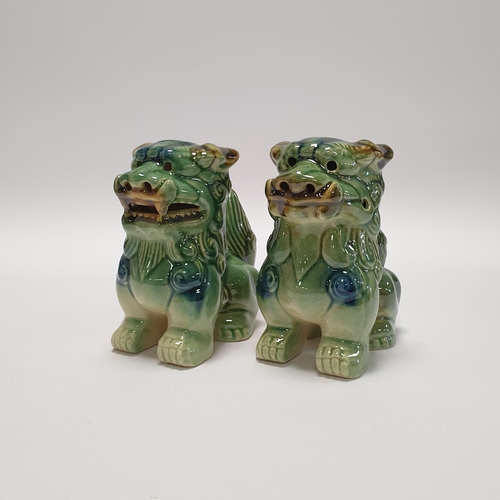 30 - Pair of Ceramic Fu Dog ornaments, approx. 14cm high