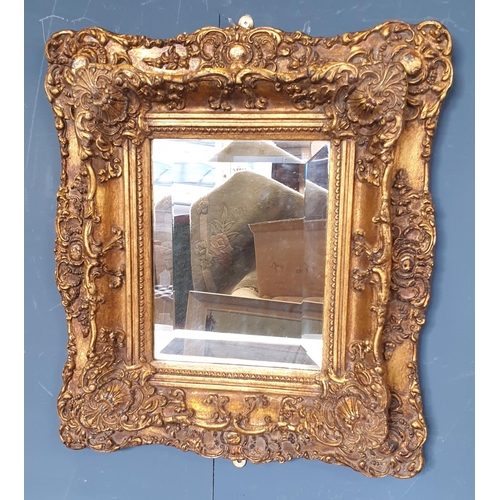 52 - Ornate gilt frame wall mirror, from Carvers & Gilders, 42cm x 46cm