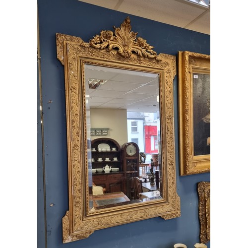 46 - Ornate Bevelled Edge Gilt framed mirror. H:125 x W:78cm