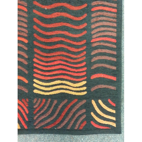 19 - Two Modern Rugs measuring 175 x 115cm (Red) and 157 x 120cm (Green)