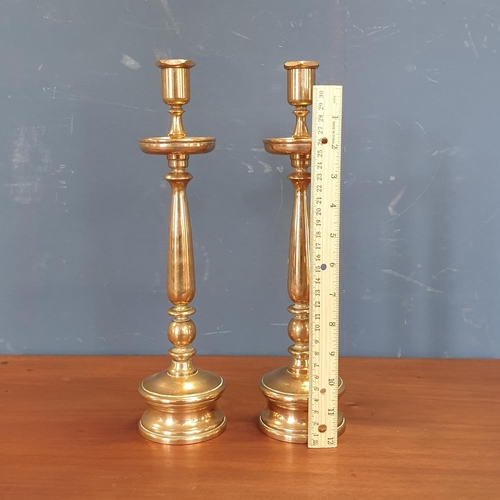 21 - Pair of Brass Candlesticks, Height 34cm