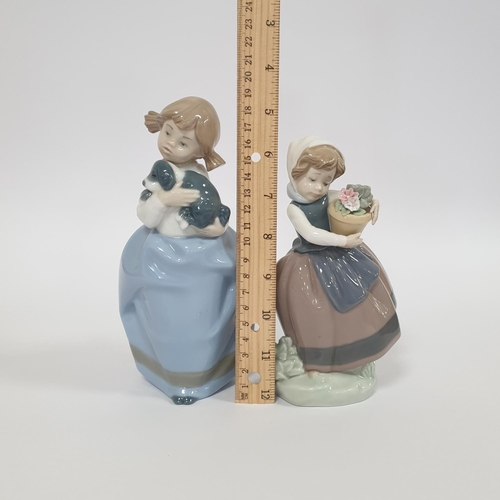 56 - A Lladro and a Nao Porcelain Figure, Tallest 19cm approx.