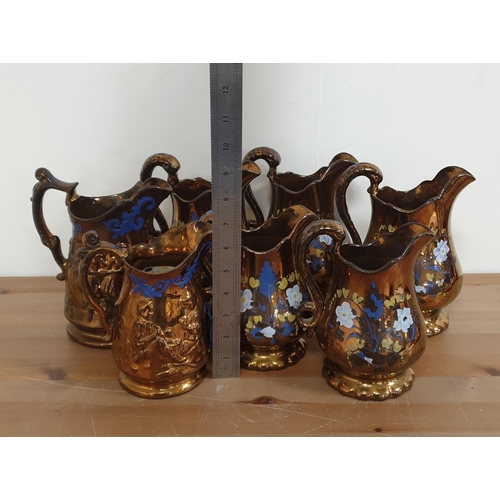 102 - Collection of 7x Lustre Jugs