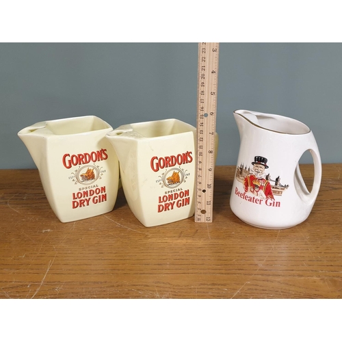 112 - Lot of 3x Jugs to include 2x Gordon's and a Beefeater Gin Pub Jug