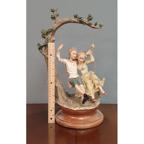 120 - Capidomonte Ornament - Couple on Swing. Height: 44cm