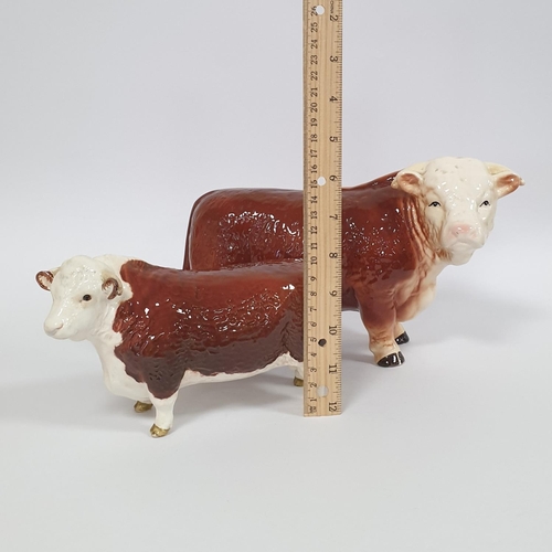 122 - Lot of 2x Ornaments to include  Beswick Porcelain Bull and  Melba Porcelain Bull, tallest 16cm