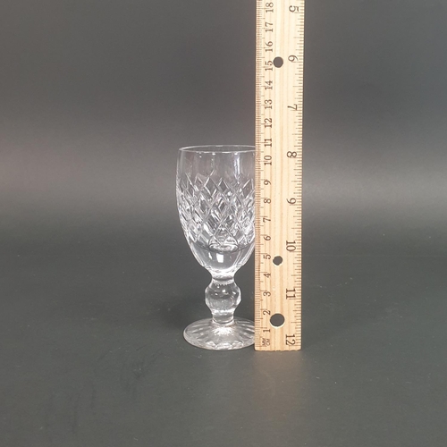 198 - A Waterford Crystal Decanter (H:28cm) and Four Sherry Glasses (H:10.5cm)