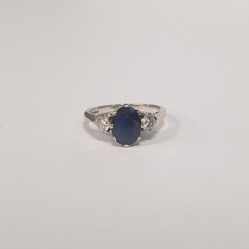 312 - An 18ct White Gold Two Stone Diamond and Oval Sapphire Dress Ring. Diamond approx 28pts, Sapphire ap... 