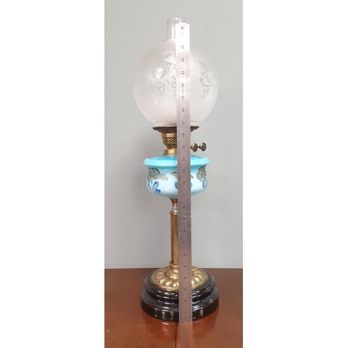 293 - Victorian Oil Lamp with Baby Blue and Gilt Resevoir and Glass Shade and Funnell  H: 68cm