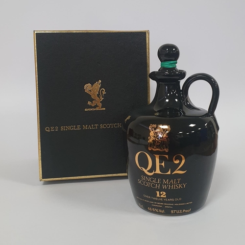 372 - QE2 12 Year Old Single Malt Scotch Whisky along with a brass Brandy Warmer and others