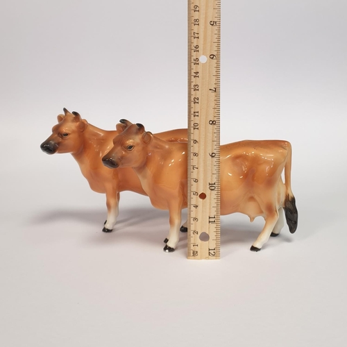 377 - Pair Porcelain Cow Ornaments, Height 11cm