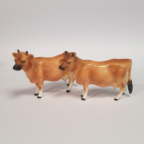 377 - Pair Porcelain Cow Ornaments, Height 11cm