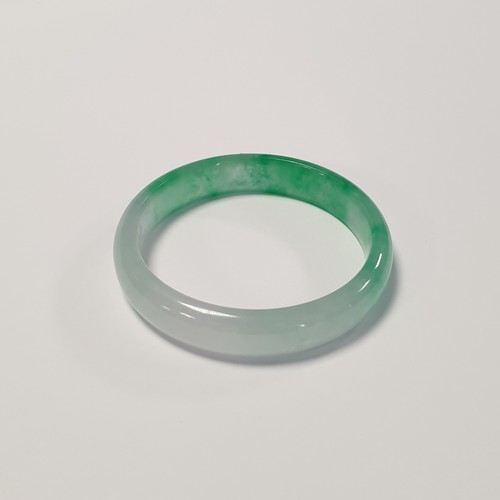 496 - Jade Bracelet. Opening measures 6cm in Diameter