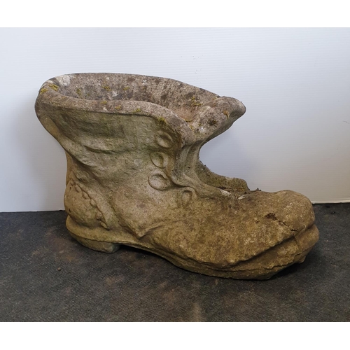 534 - Two Large Concrete Planters in the form of Boots, H:35 x W:25 x D:65cm approx.