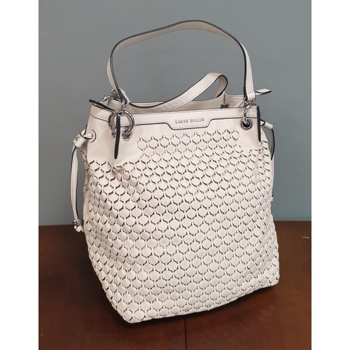 587 - A Karen Miller Designer Cream Leather Handbag with Protective Bag